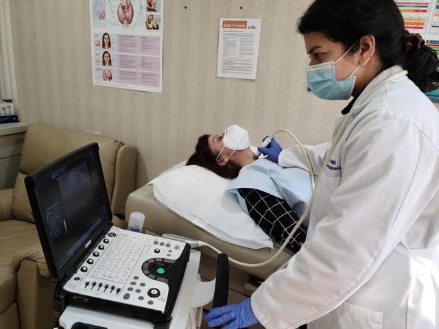 women undergoing thyroid testing