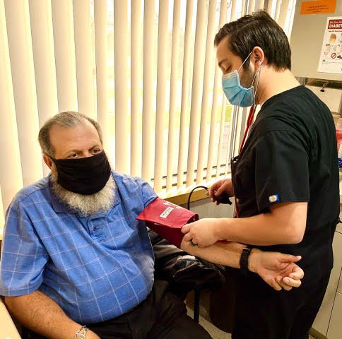 thumb pointing to nutrition label