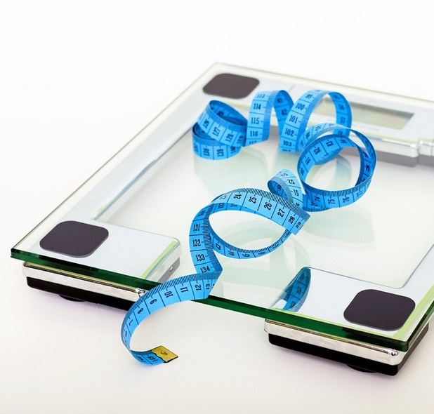 blue tape measure on scale